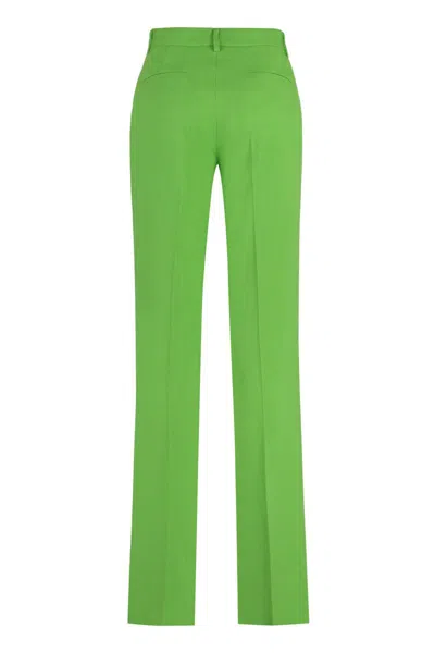 Msgm Flared Viscose Trousers In Green