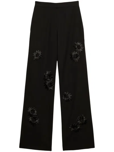 Msgm Floral-embroidered Trousers In Black