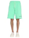 Msgm Light Green Solid Shorts In Multi
