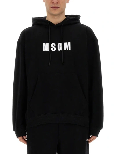 Msgm Logo Printed Drawstring Hoodie In Black