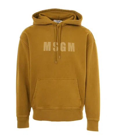 Msgm Logo Printed Drawstring Hoodie In Yellow