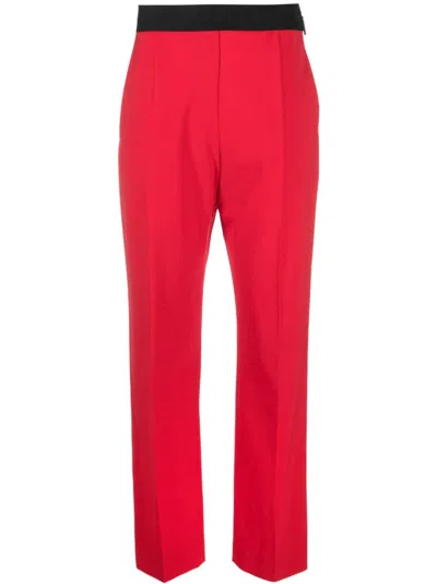 Msgm Logo Waistband Tapered Trousers In Red