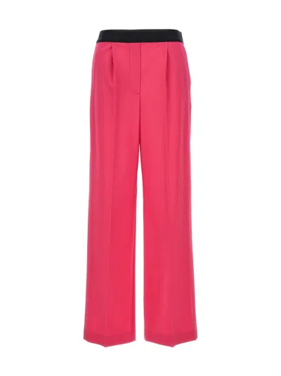 Msgm Pants With Front Pleats In Red