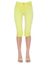 Msgm Mid-length Slim Fit Jeans In Yellow