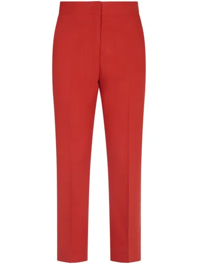 MSGM TAILORED RED TROUSERS WITH STRUCTURED WAISTBAND
