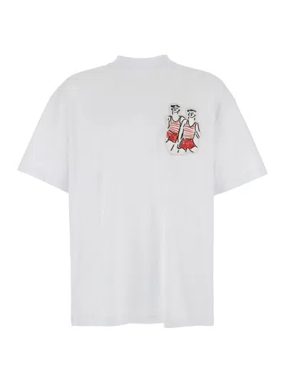 MSGM WHITE CREWNECK T-SHIRT WITH PATCH ON THE FRONT AND LOGO LETTERING ON THE BACK