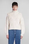 Mvp Wardrobe Trigger Knit Turtleneck Sweater In Beige