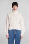 Mvp Wardrobe Trigger Knit Turtleneck Sweater In Beige