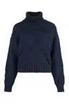 Mvp Wardrobe Trigger Knit Turtleneck Sweater In Panna