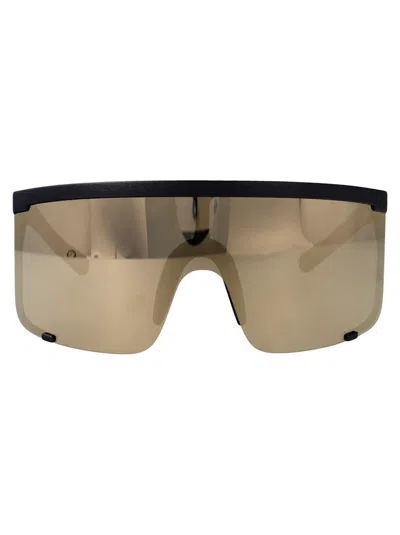 Mykita Sunglasses In 301 Md1 Pitch Black Gold Shield