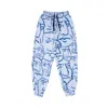 Mysimplicated Men's Trousers In Blue With Faces Design - Recycled Fabric In Blue