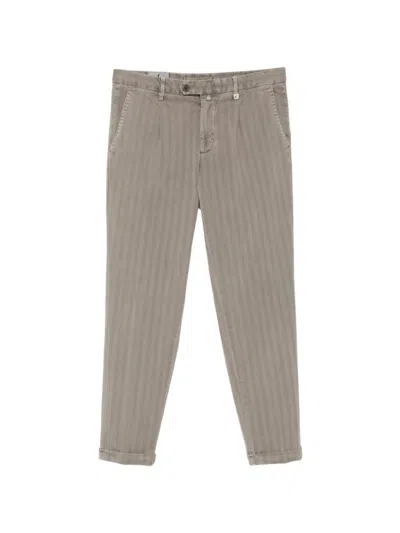Myths Herringbone-pattern Pleated Trousers In Gray
