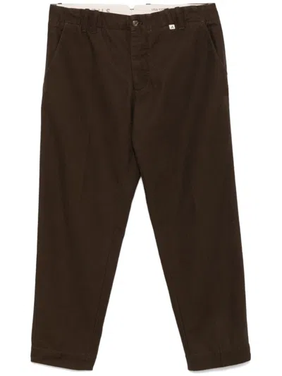 Myths Tapered Trousers In Brown