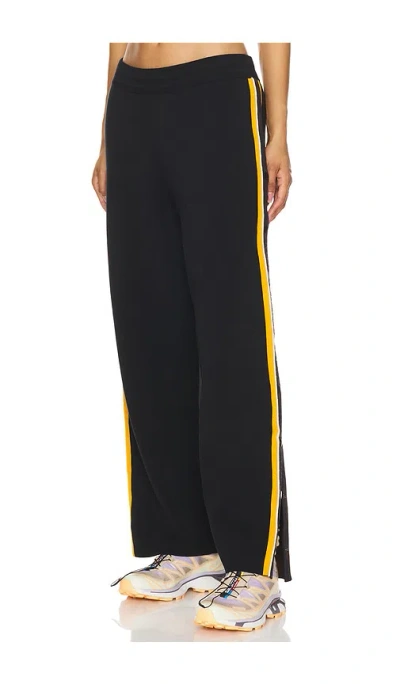 Nagnata Side Snap Track Pant In Black & Tumeric