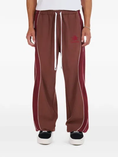 Nahmias Ollie Colourblock Piped-detail Trousers In Brown