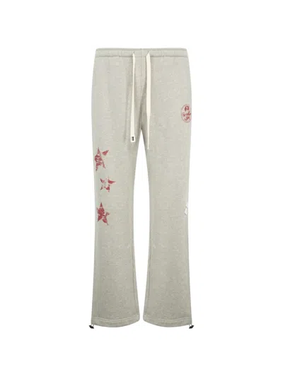 Nahmias Youth Enrichment Wide-leg Logo-print Distressed Cotton Sweatpants In Gray