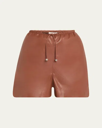 Nanushka Aniela Alt-leather Drawstring Shorts In Henna