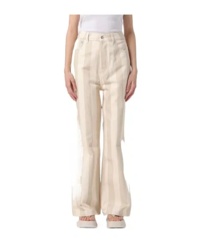 Nanushka Belt Loop With Jeans In Beige