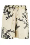 Nanushka Ceylin Logo-printed Drawstring Shorts In Beige