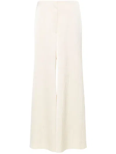 Nanushka Crepe Wide Trousers In Neutrals