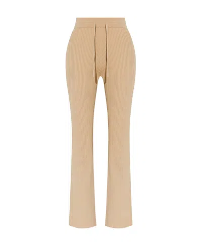 Nanushka Drawstring Knitted Flared Trousers In Nude