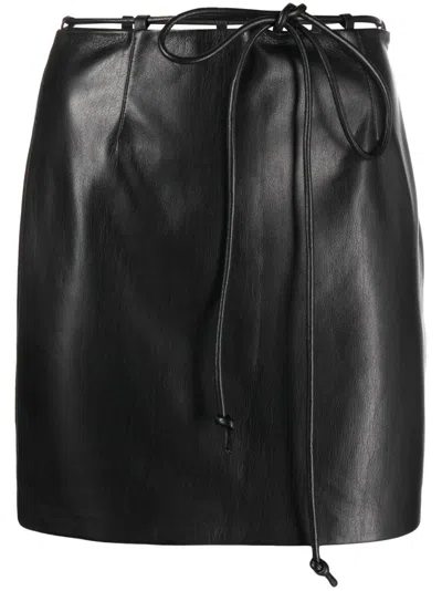 Nanushka Faux Leather Miniskirt In Black