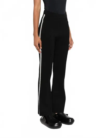 Nanushka Franna Flare Pants In Black/creme In Blue