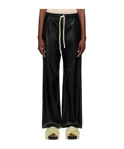 Nanushka Gisela Faux-leather Trousers In Black