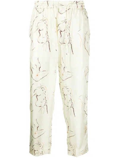 Nanushka Graphic-print Cropped Trousers In Beige