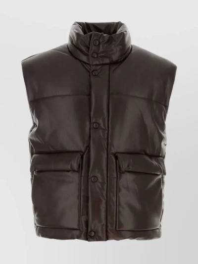 NANUSHKA JOVAN QUILTED SLEEVELESS JACKET WITH HIGH NECK AND FLAP POCKETS