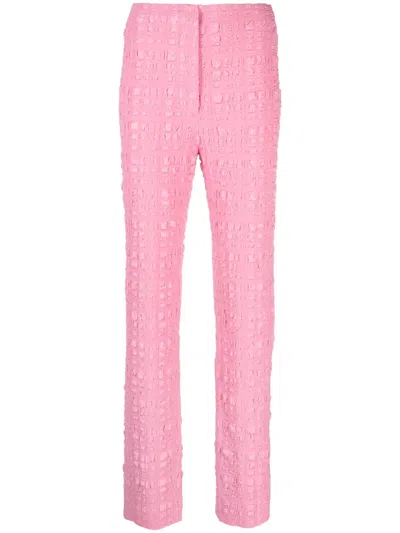 Nanushka Juna Seersucker Slim-fit Trousers In Pink
