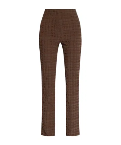 Nanushka Juna Seersucker-texture Slim-fit Trousers In Brown