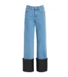 Nanushka Raynee Jeans With Alt-leather Cuffs In Blue