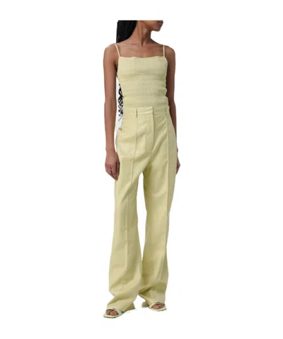 Nanushka Leena Faux-leather Flared Trousers In Green