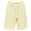Nanushka Munira Okobor Vegan Leather Drawstring Bermuda Shorts In Yellow
