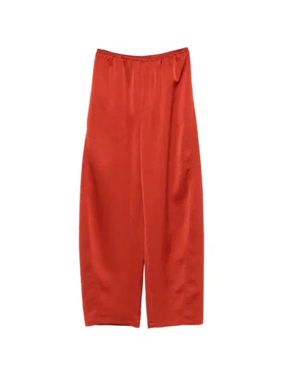 Nanushka Zoela Elastic Waist Barrel Leg Trousers In Orange
