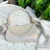Nash Grey Andie Crocodile Iridescent Handbag With Pearl Chain And Chic Bow In White In White