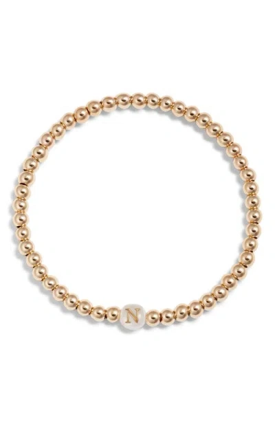 Nashelle Mother Of Pearl Initial Beaded Bracelet In Gold Fill N