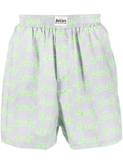 Natasha Zinko All-over Slogan-print Cotton Shorts In Grey