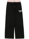 Natasha Zinko Layered Logo-print Trousers In Black