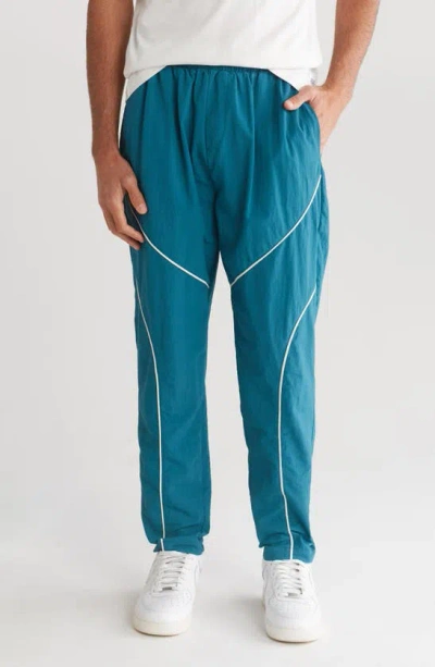 Native Youth Piped Track Joggers In Blue