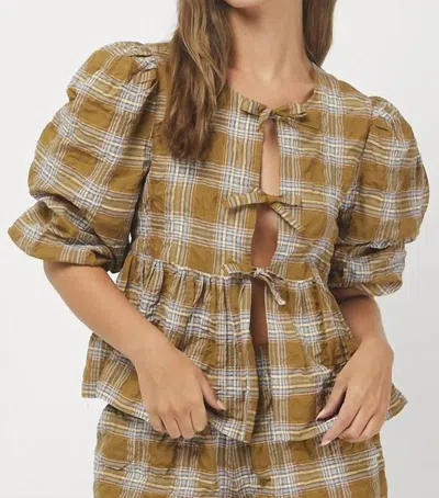 Needii Plaid Peplum Puffy Tie Top In Olive In Green