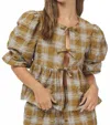Needii Plaid Peplum Top In Olive/ Multi Plaid
