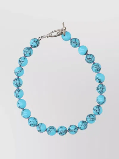 Needles Beaded Bracelet Featuring Unique Design In Blue
