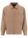 Needles Elasticated Hem Overshirt With Practical Side Pockets In Beige