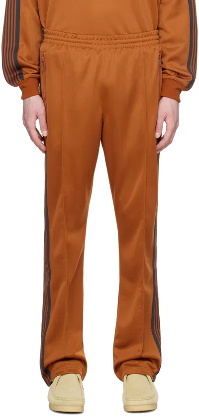 Needles Orange Narrow Track Pants In A-rust