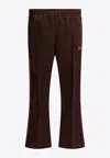 Needles Poly Smooth Logo Boot-cut Pants In Brown