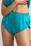 Negative Eclipse Washable Silk Mini Short In Cove In Blue