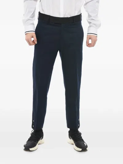 Neil Barrett Contrast-edging Ankle-button Trousers In Blue