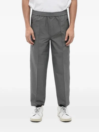 Neil Barrett Elasticated-waistband Zip-pocket Trousers In Gray